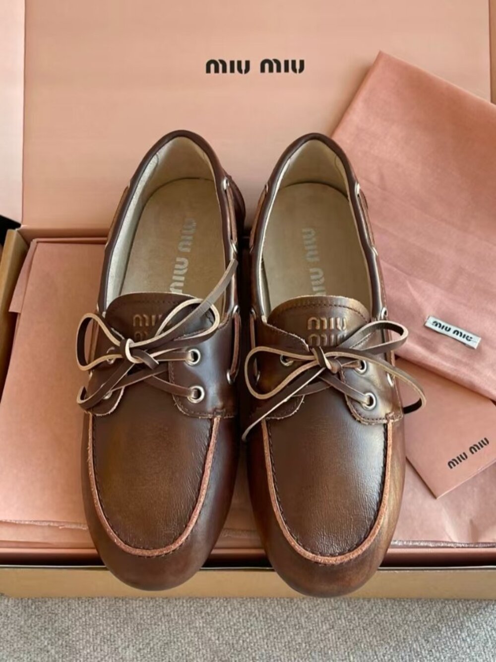 Miu Miu Whitened leather sailing shoes